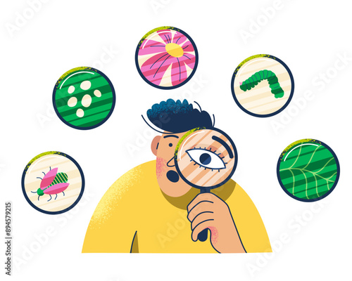 Boy holding a magnifying glass and observing nature. Schoolboy exploring insects, flowers, leaf, studying nature