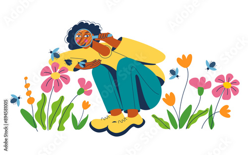 Girl holding a magnifying glass and observing nature. Schoolgirl exploring insects, flowers, looking and studying nature