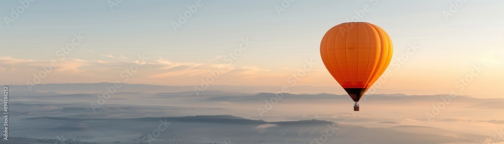 Fototapeta premium 2025 shaped hot air balloon floating over a landscape