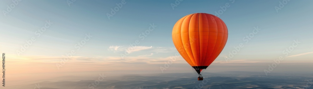 Fototapeta premium 2025 shaped hot air balloon floating over a landscape