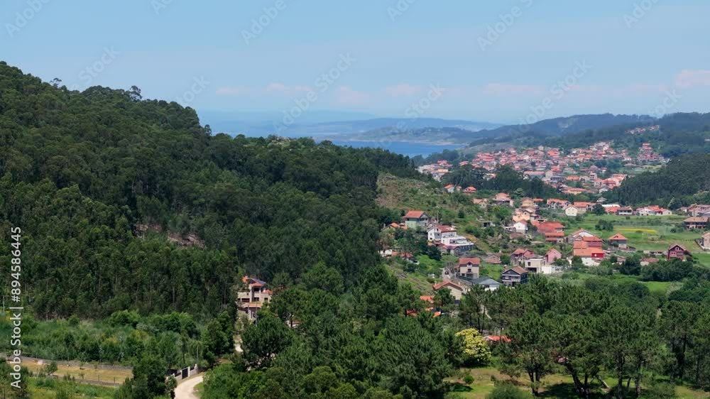 Lush Mountains And Hillside Settlements At Cangas In A Coruña, Galicia Spain. Aerial Drone Shot Lush Mountains And Hillside Settlements At Cangas In A Coruña, Galicia Spain. Aerial Drone Shot