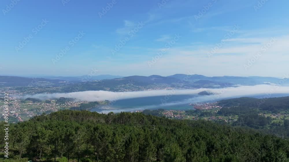 Scenic Aerial View Of Mountains And Coastal Towns During Sunrise Near Pontevedra, Spain. Scenic Aerial View Of Mountains And Coastal Towns During Sunrise Near Pontevedra, Spain.