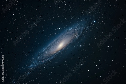 Andromeda galaxy, the second prominent spiral milky way in space, is visible on camera with high resolution and high details. The background stars form an oval shape, which adds to its beauty. photo