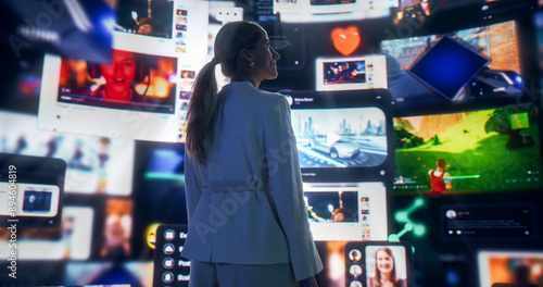 Papier peint Backview Of Caucasian Woman Looking at Cyberspace Internet Interface Browsing Web Content, Watching Video Streaming, Social Media