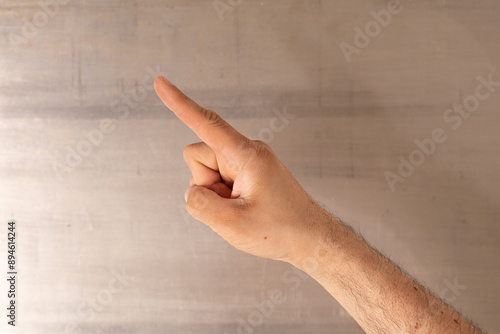 A hand pointing to the right