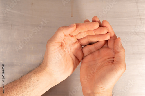 A pair of hands cupped toge...
