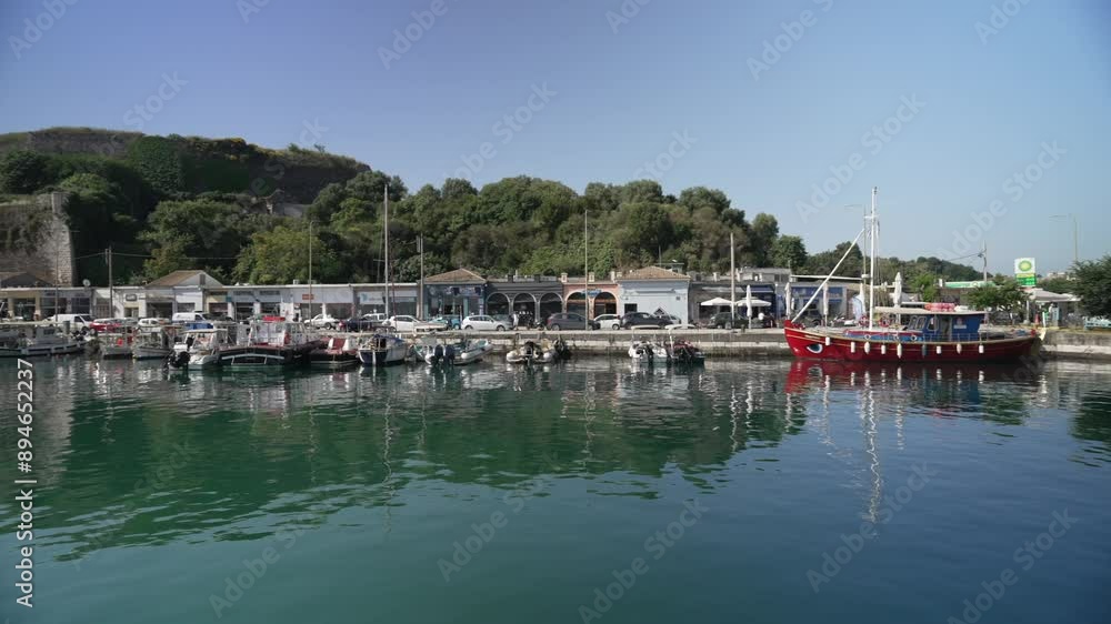 View of Old Port Marina and New Venetian Fortress, UNESCO World Heritage Site, Corfu Town, in the morning, Corfu, Ionian Sea, Greek Islands, Greece View of Old Port Marina and New Venetian Fortress, UNESCO World Heritage Site, Corfu Town, in the morning, Corfu, Ionian Sea, Greek Islands, Greece