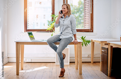 Wallpaper Mural Mature woman, business owner and office with phone call, planning or discussion with idea for project. Web creative, designer and communication with smartphone, entrepreneur and company negotiation Torontodigital.ca