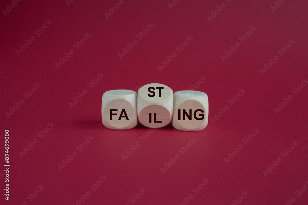 Fasting or failing symbol. Concept words Fasting or Failing on wooden cubes. Beautiful red background. Business fasting or failing concept. Fasting or failing symbol. Concept words Fasting or Failing on wooden cubes. Beautiful red background. Business fasting or failing concept.