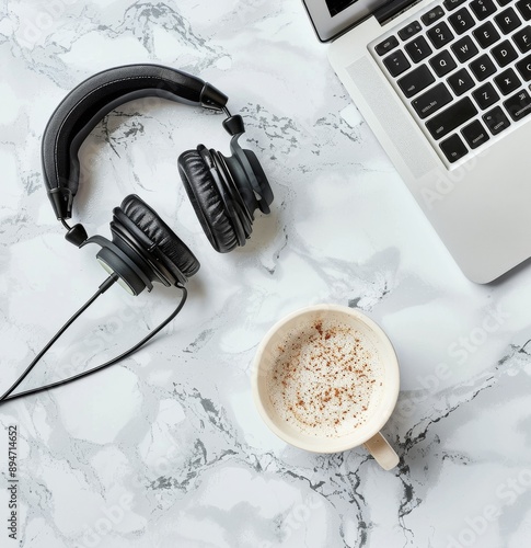 Laptop, Headphones, and Coffee in a Cafe