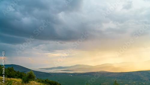 Delphi, Greece. Clouds with rain over the valley. Northern coast of the Gulf of Corinth, Itea Bay