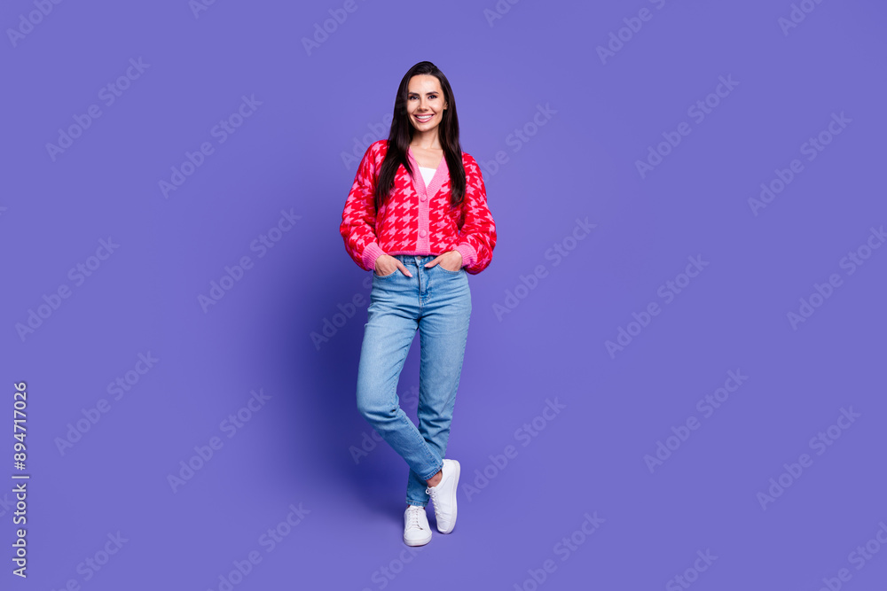 Full length photo of shiny attractive lady dressed pink cardigan smiling empty space isolated violecolor background Full length photo of shiny attractive lady dressed pink cardigan smiling empty space isolated violecolor background