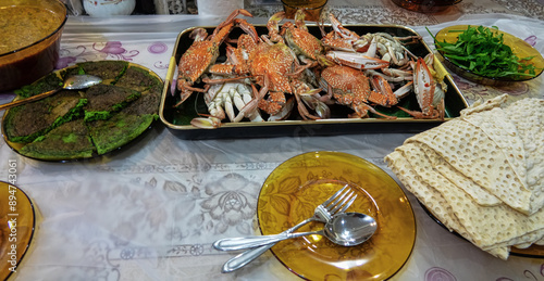 Crab dish (boiled crabs) and tortillas in an Iranian restaurant photo