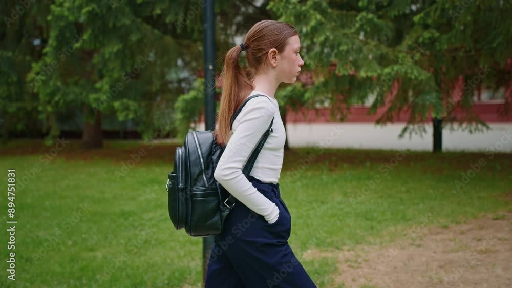 Teen Girl Walks Through Park on Summer Day Teen Girl Walks Through Park on Summer Day