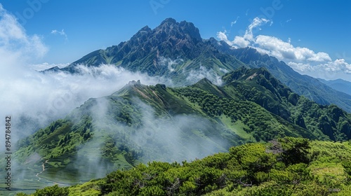 Majestic Mountain Range Above the Clouds © Sandu