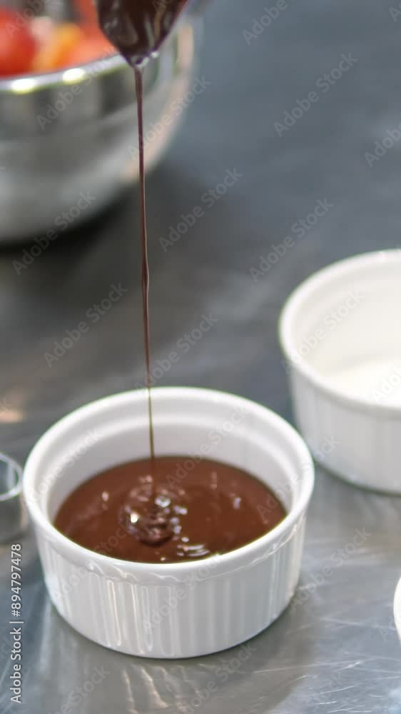 chocolate fondant making process. Step by step mixing ingredients close up Cooking chocolate fondant, pouring into molds, process chocolate fondant making process. Step by step mixing ingredients close up Cooking chocolate fondant, pouring into molds, process