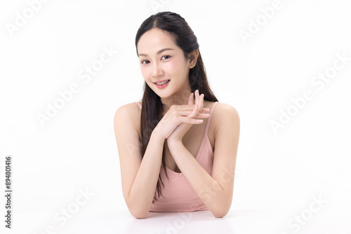 Close-up portrait of young Asian beautiful woman with K-beauty make up style and healthy and perfect skin isolated on white background for skincare commercial product advertising.