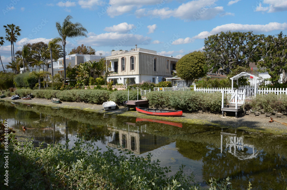 Obraz premium Canals of Venice in California with amazing houses, boats, palm trees on the shore
