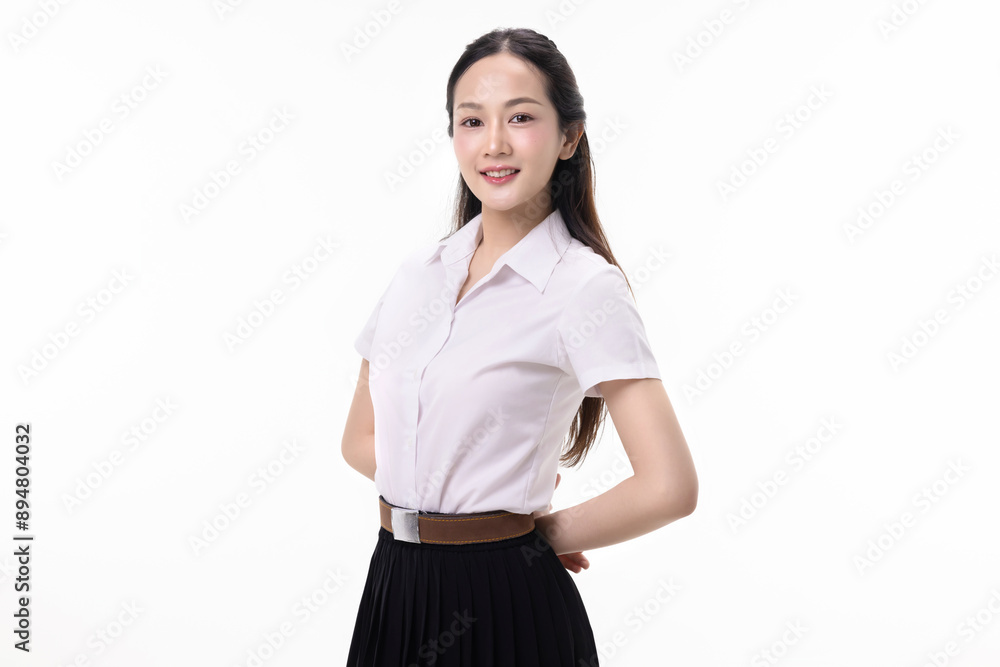 Portrait pretty Asian student girl in Thai university uniform isolated on white background. Portrait pretty Asian student girl in Thai university uniform isolated on white background.