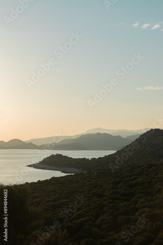 Sunset in the mountains with olive groves over the Mediterranean sea