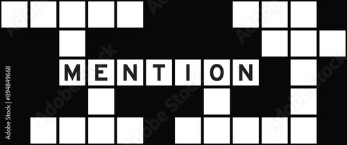 Alphabet letter in word mention on crossword puzzle background