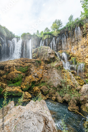 The scenic views of Yerköprü Waterfall located on the Göksu River in the Hadim District of Konya with a magnificent beauty that can enchant everyone with its unique natural beauty. photo