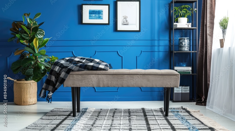 Fototapeta premium Stylish Living Room with Bench, Black Stand, Gray Plaid, Carpet, Blue Wall, and Accessories. Home Decor. Blank Space.