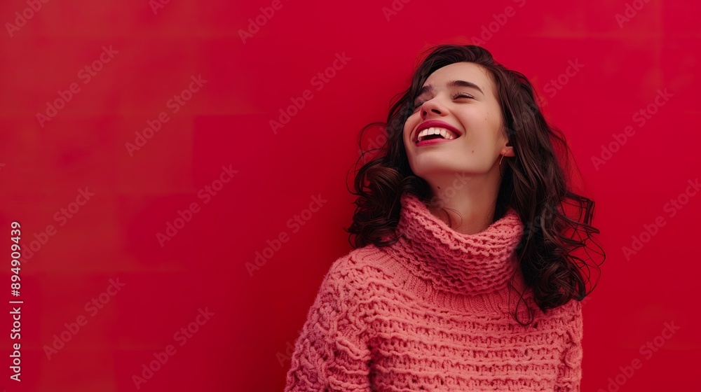 a stylish brunette woman in a casual pose, smiling and talking to a friend, against a vibrant red background a stylish brunette woman in a casual pose, smiling and talking to a friend, against a vibrant red background