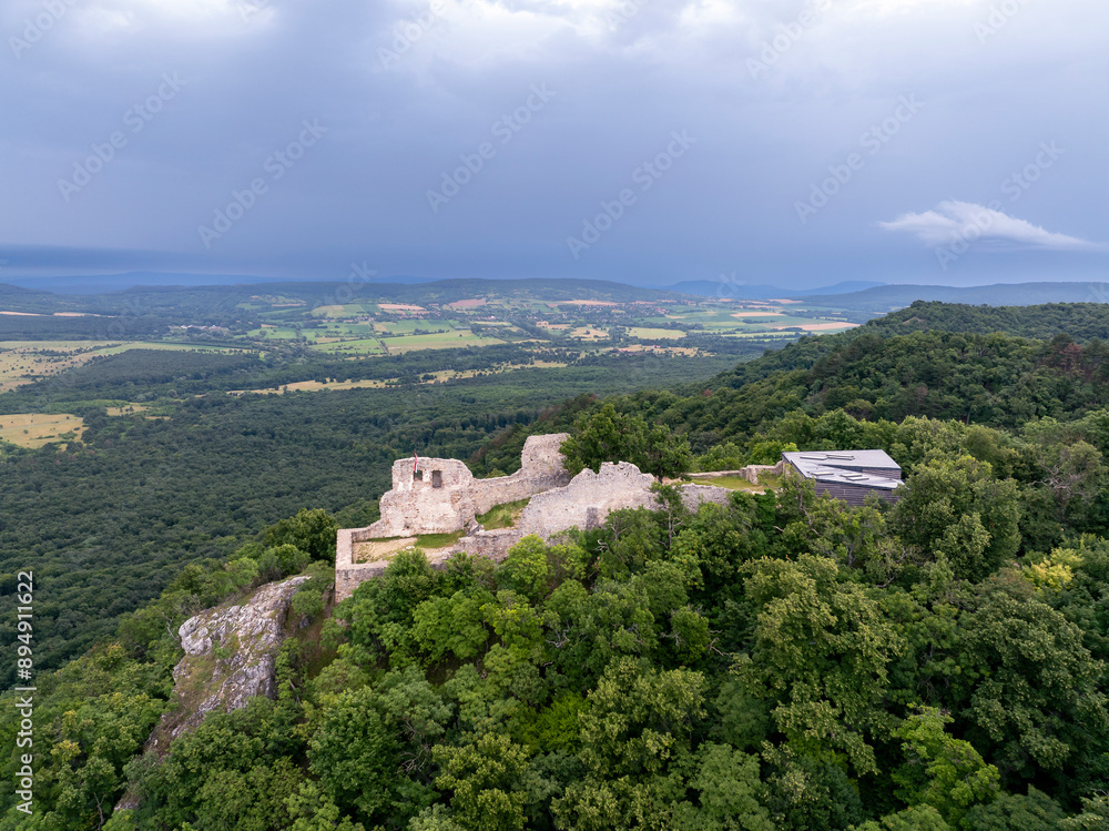Aerial view about the castle Rezi (Hungarian name is Rezi Var) This is an historical ancient fort ruins in Balaton uplands region. Built in XI. century. Famous hiking place in this region free entry Aerial view about the castle Rezi (Hungarian name is Rezi Var) This is an historical ancient fort ruins in Balaton uplands region. Built in XI. century. Famous hiking place in this region free entry