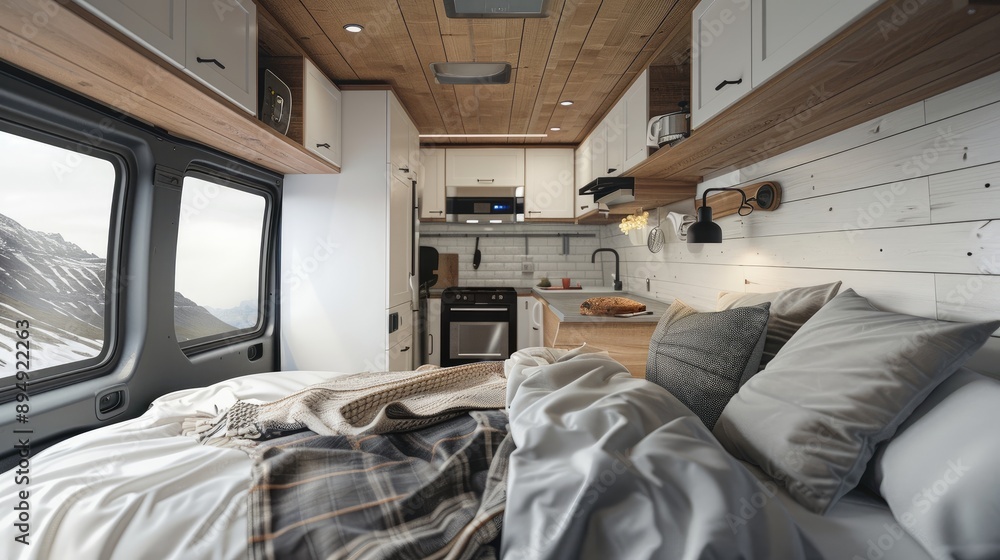 Fototapeta premium Scandinavian-inspired camper van interior, highlighting a cozy bed and kitchen room, ideal for vacation and camping trips