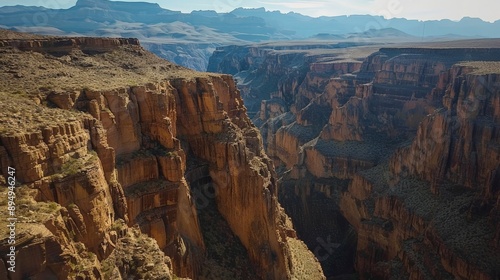 Discover the rugged beauty of a canyon landscape, showcasing the dramatic cliffs and valleys from above.