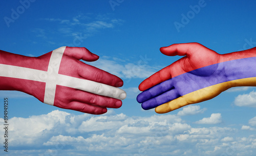 Armenia and Denmark country handshaking with flags, consensus concept international co-operation illustration