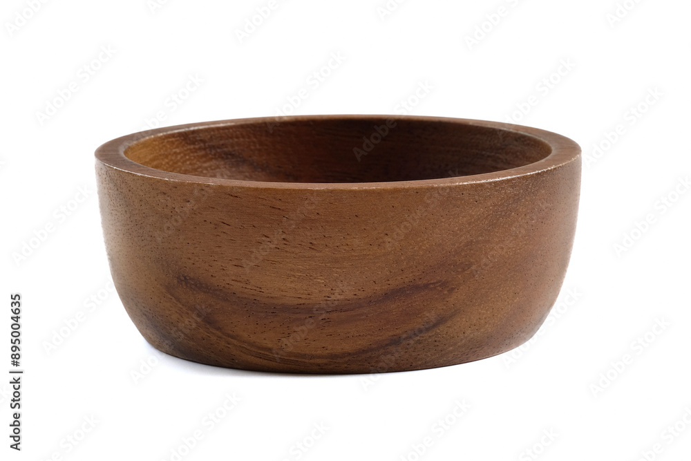 Wooden bowl close up on white background. Wooden bowl close up on white background.