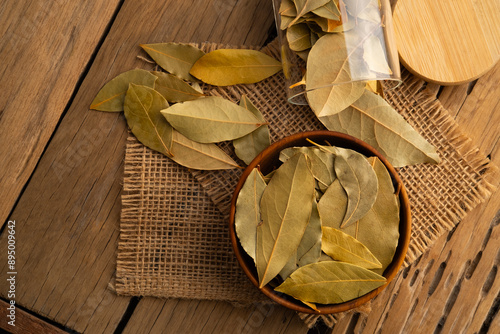 Close up dried Bay leaf,aromatic leaf commonly used as a herb in cooking.with copy space.Top view. photo