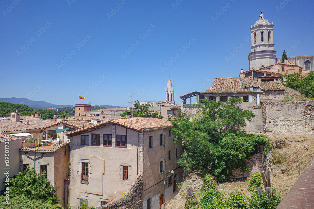 Girona, Spain - 23 July, 2024: Views over the city of Girona from the city walls, Girona, Catalonia Girona, Spain - 23 July, 2024: Views over the city of Girona from the city walls, Girona, Catalonia
