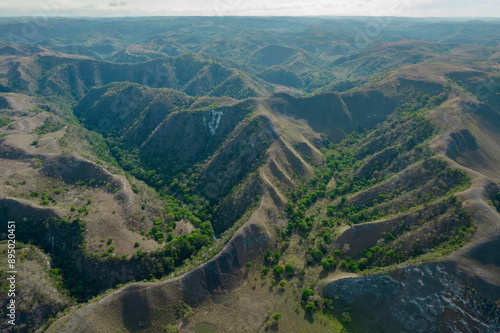 Aerial view over the vast Bukit Wairinding area of East Nusa Tenggara, Indonesia, East Nusa Tenggara, Indonesia; Makamenggit, Nggaha Oriangu, East Sumba Regency, East Nusa Tenggara, Indonesia photo