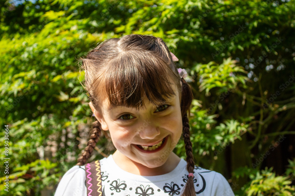 little child girl smiling outside in nature little child girl smiling outside in nature