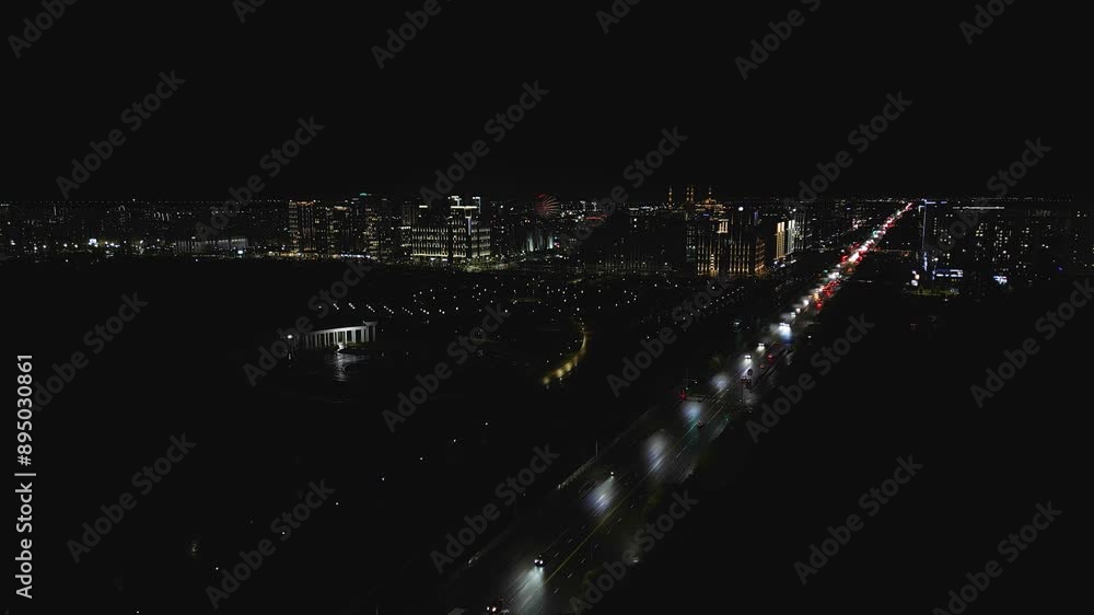 Astana, Kazakhstan, Central Asia - Nighttime Cityscape of the Bustling City - Aerial Drone Shot Astana, Kazakhstan, Central Asia - Nighttime Cityscape of the Bustling City - Aerial Drone Shot