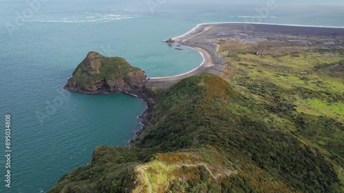 Omanawanui Track With View Of Paratutae Island, Whatipu Beach, And Ninepin Rock In Auckland, New Zealand. aerial shot photo