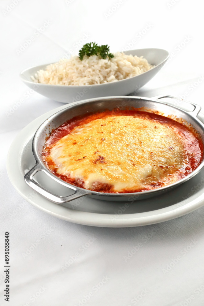 Filet Mignon with Parmigiana with white rice Filet Mignon with Parmigiana with white rice