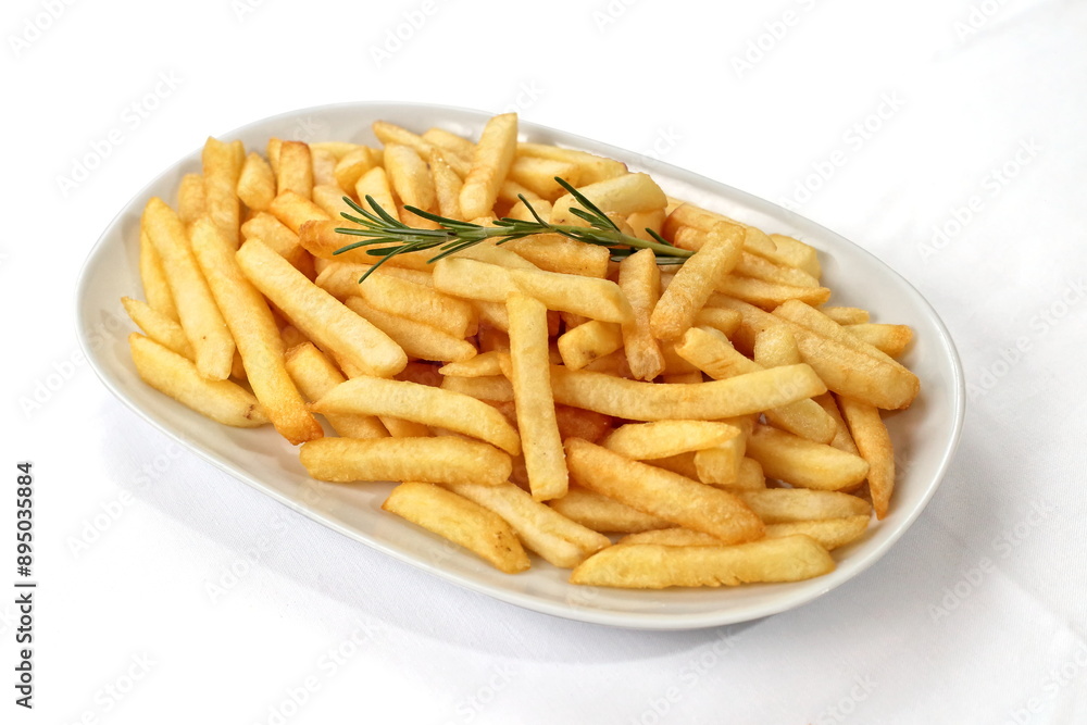 French fries in bowl seen from above on white background French fries in bowl seen from above on white background