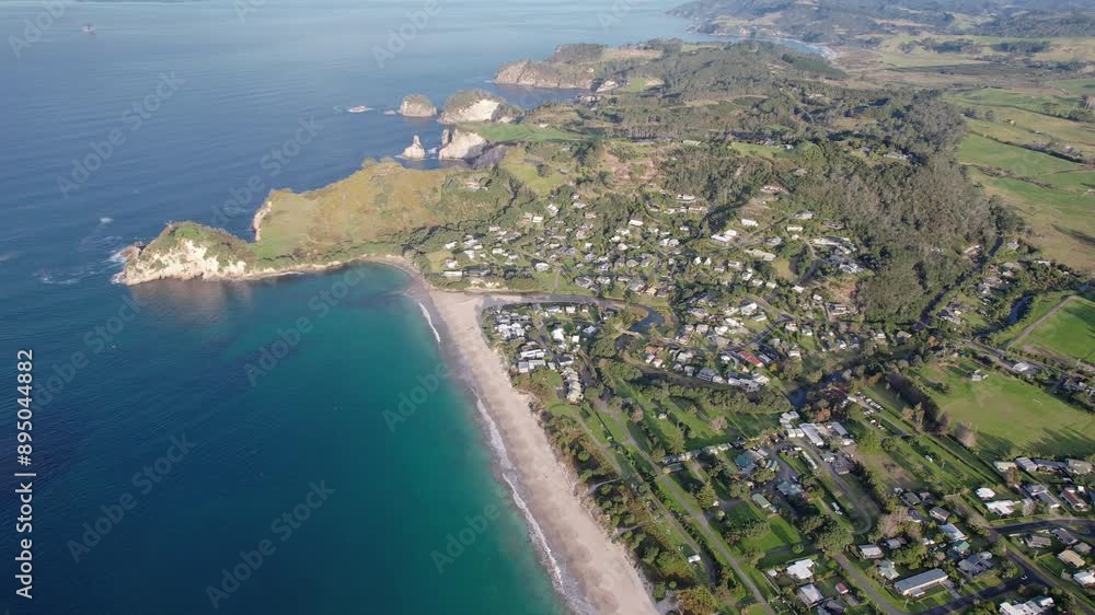 Hahei Beach With Te Pare Point Historical Landmark In The Background, North Island, New Zealand. Aerial Drone Shot Hahei Beach With Te Pare Point Historical Landmark In The Background, North Island, New Zealand. Aerial Drone Shot