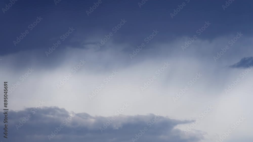 TIMELAPSE OF CLOUDS ON A CLOUDY DAY WITH SOME RAIN 