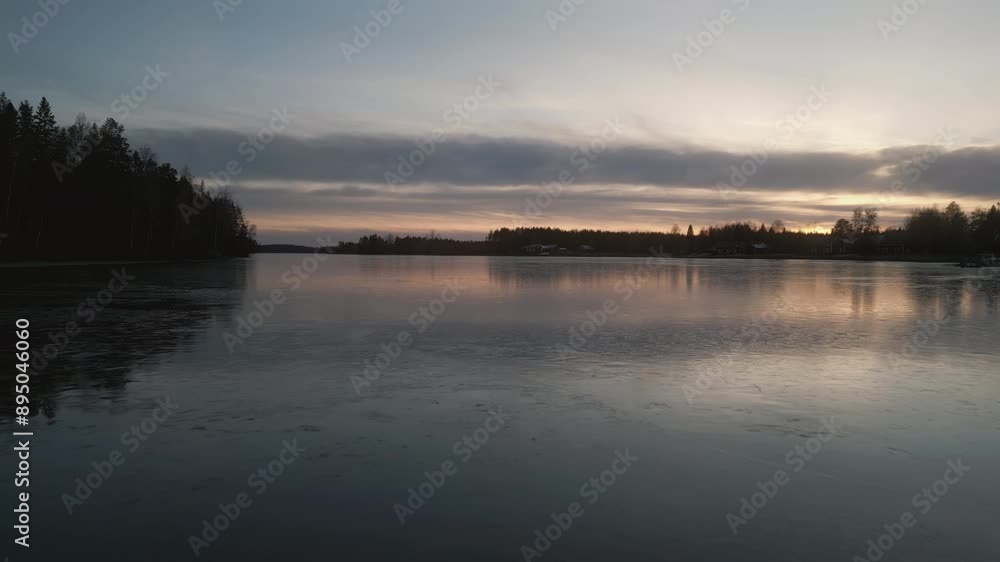 Ice Mirror on Lake in Evening, Finland, PullBback  Aerial  