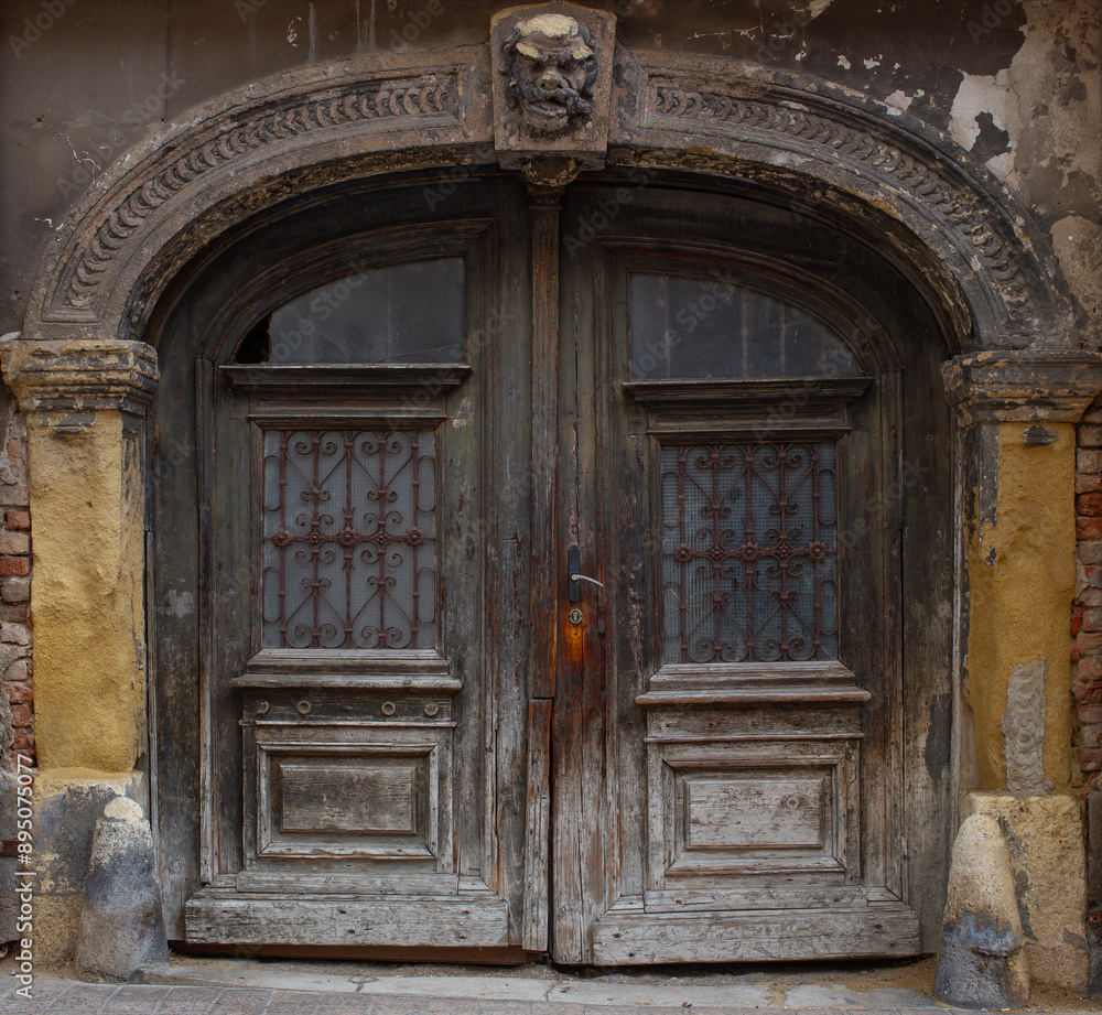 Old wooden door of ancient abandoned architecture in Zagreb, Croatia. Old wooden door of ancient abandoned architecture in Zagreb, Croatia.