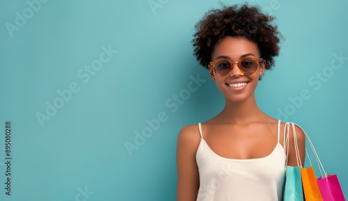 Smiling Woman Holding Shopping Bags