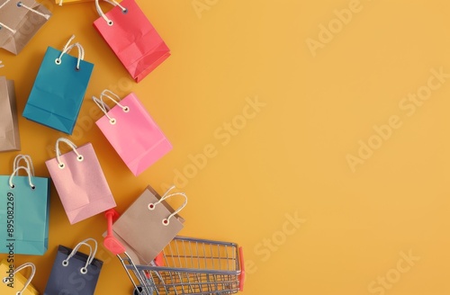 Shopping Bags and Cart on Yellow Background