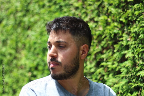 Young Tattooed Man in Sporting Clothes in the City of Zurich on a Sunny Day