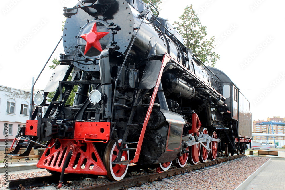 Obraz premium The retro train stands on the rails.