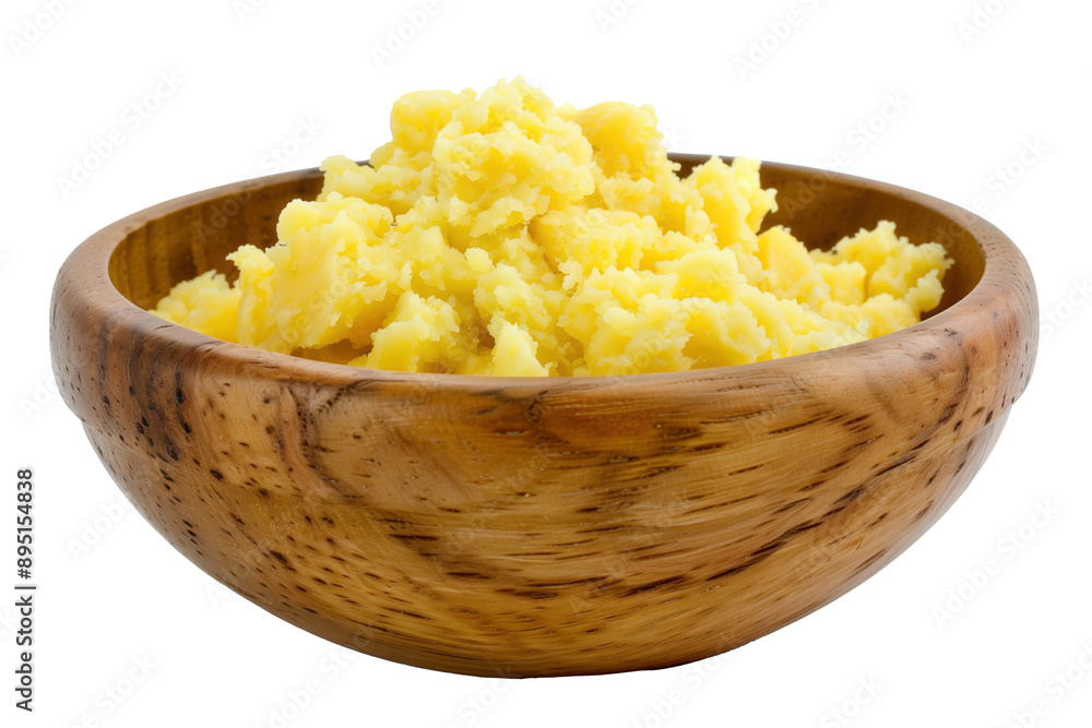 Creamy mashed potatoes in wooden bowl with basil garnish on transparent background Creamy mashed potatoes in wooden bowl with basil garnish on transparent background